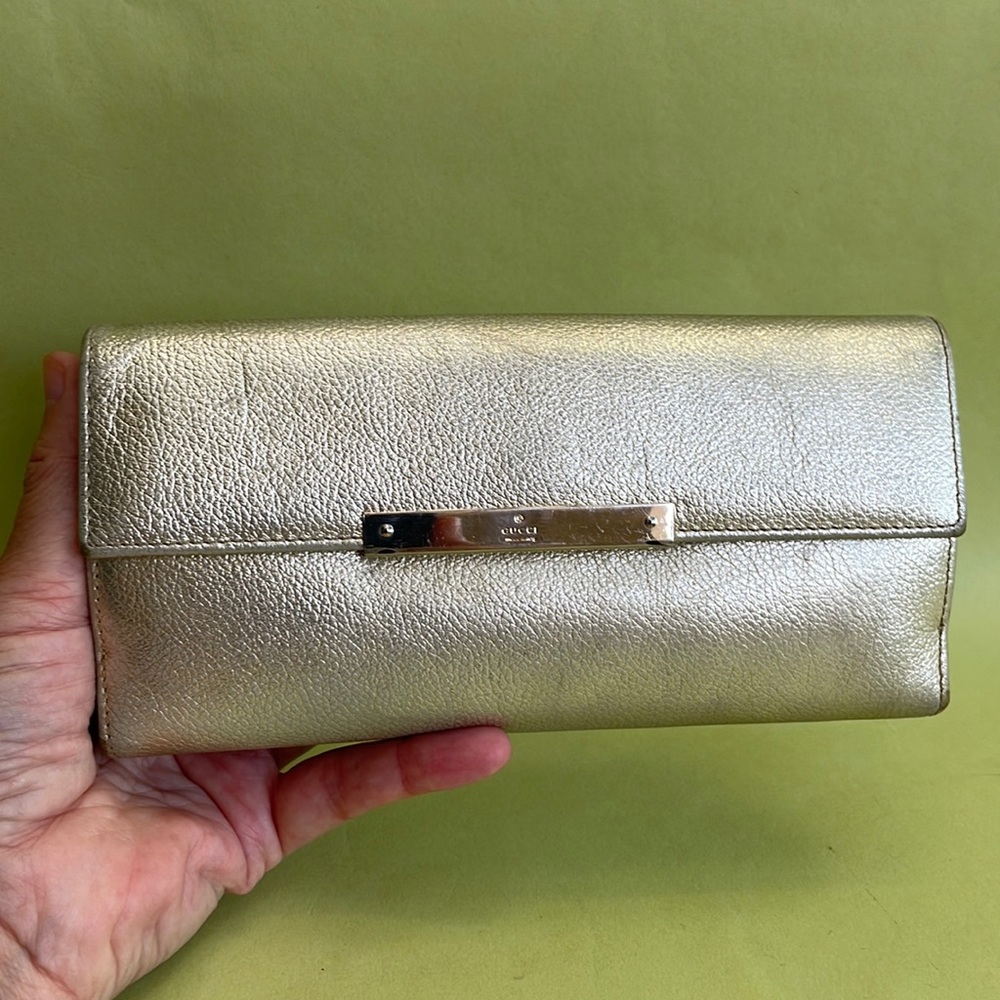 Large Vintage metallic gold Gucci pebbled leather wallet